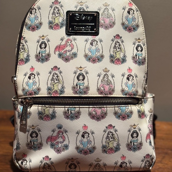 Loungefly Handbags - Loungefly Cream Disney Princess Patterned Backpack